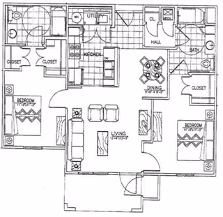 Black and white architectural floor plan of a residential unit at Birchwood Villas showing two bedrooms, two bathrooms, a kitchen, dining area, living room, utility room, closets, and a hall.