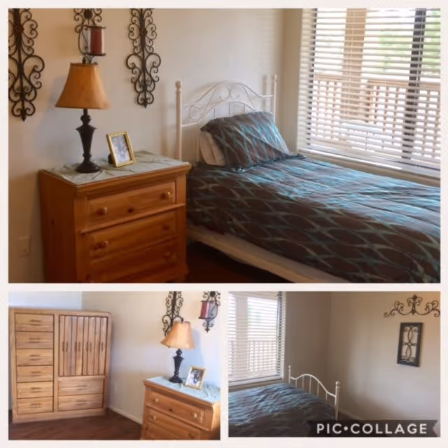 Collage of three images showing a bedroom in an assisted living facility. The main image shows a single bed with a patterned blue and brown bedspread next to a wooden nightstand with a lamp, a framed photo, and decorative wall hangings. The smaller images show a wooden dresser with multiple drawers and a continuation of the bed and nightstand from different angles. The room has wooden flooring and a window with blinds letting in natural light.