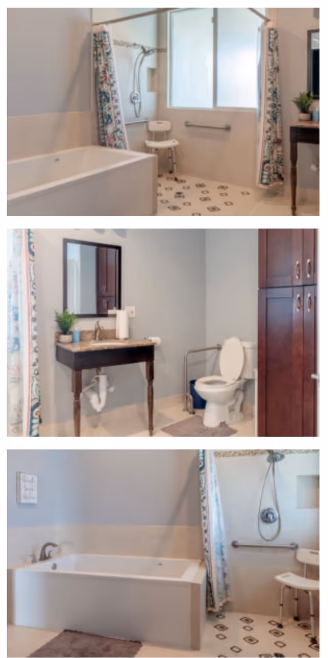 Spacious accessible bathroom showing a bathtub, walk-in shower with grab bars and shower chair, vanity sink, toilet, and tall storage cabinet.
