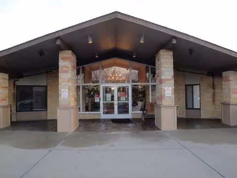 Front entrance of Envive Healthcare of Anderson with glass doors under a covered porte-cochere