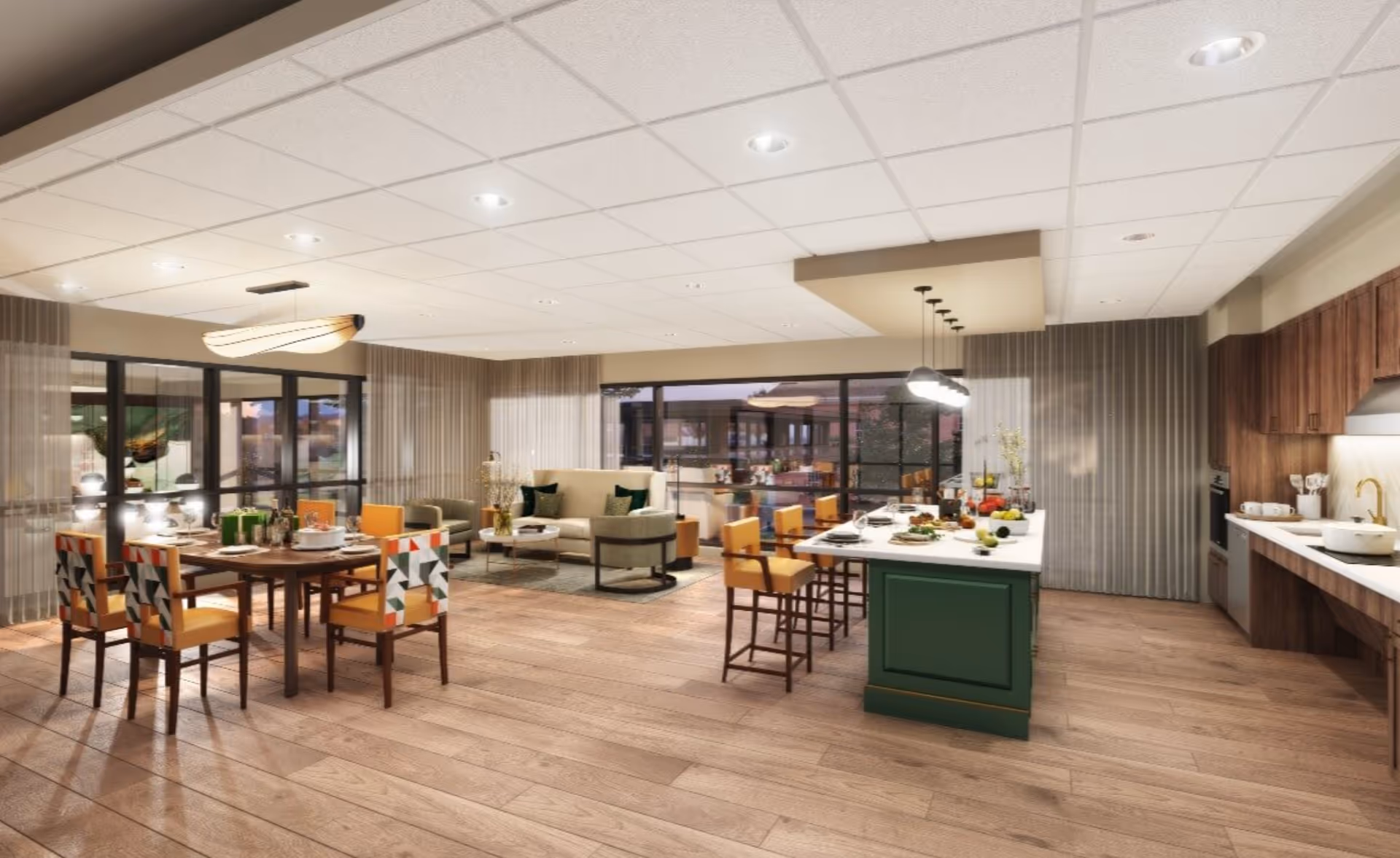 A spacious, modern open-concept room featuring a dining area with a wooden table and colorful chairs, a kitchen island with bar stools, and a cozy living area with sofas and armchairs. The room has large windows with sheer curtains, wooden flooring, and recessed ceiling lights.