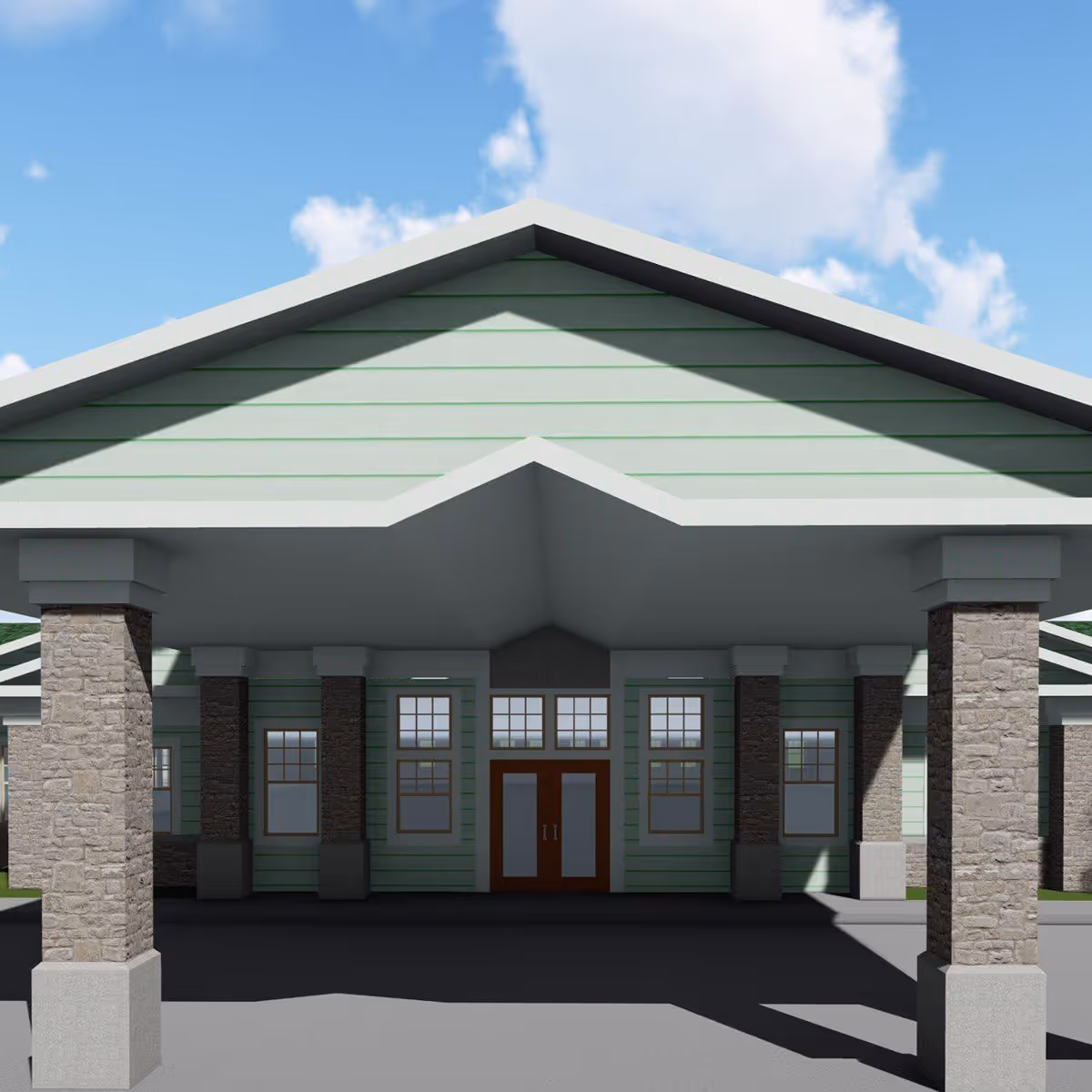 Covered front entrance with stone columns and double doors on a pale green building under a blue sky.