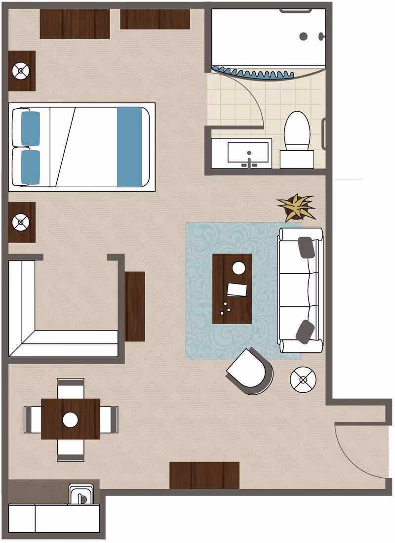 Floor plan of a living space featuring a bedroom with a double bed and two nightstands, a bathroom with a shower, toilet, and sink, a living room area with a sofa, armchair, coffee table, and plant, a dining area with a table and four chairs, and a kitchen area with a sink and counter space.
