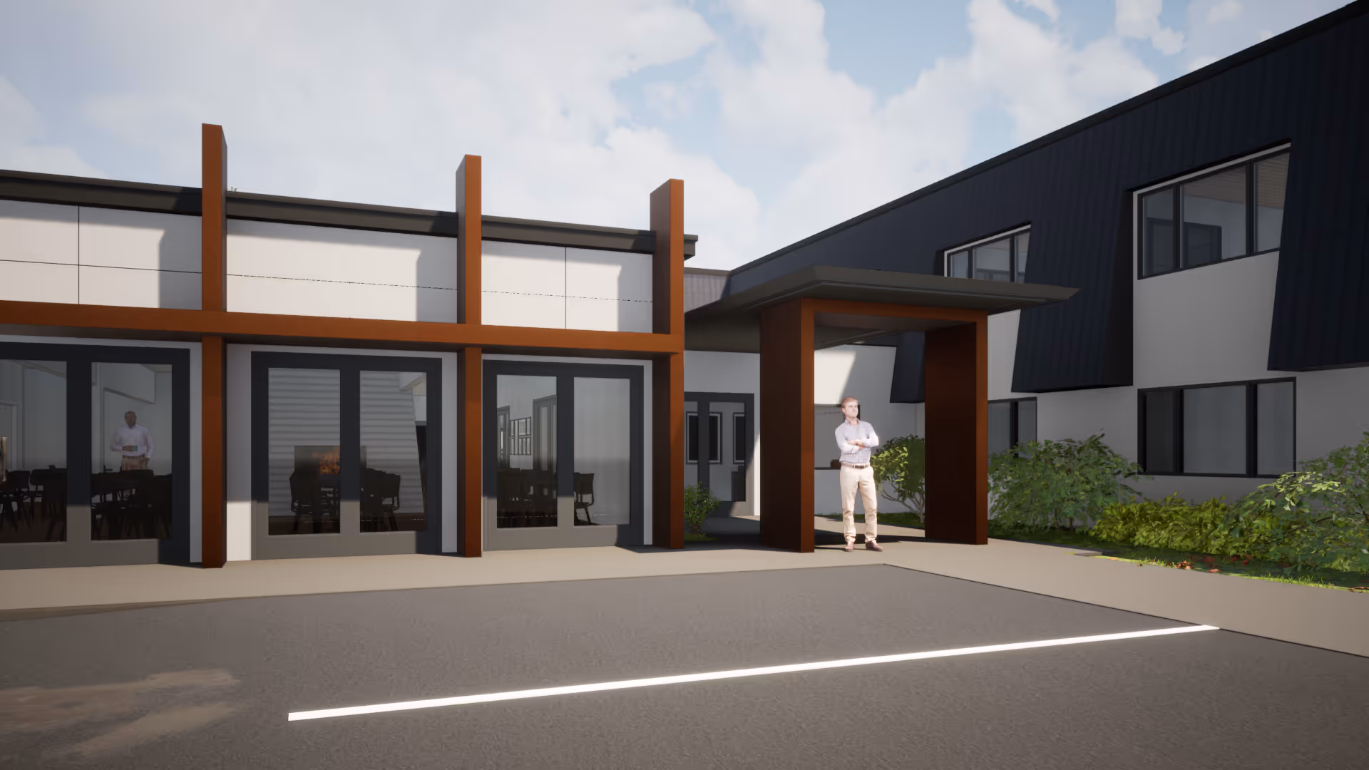 Modern assisted living facility exterior with a covered entrance and large windows.