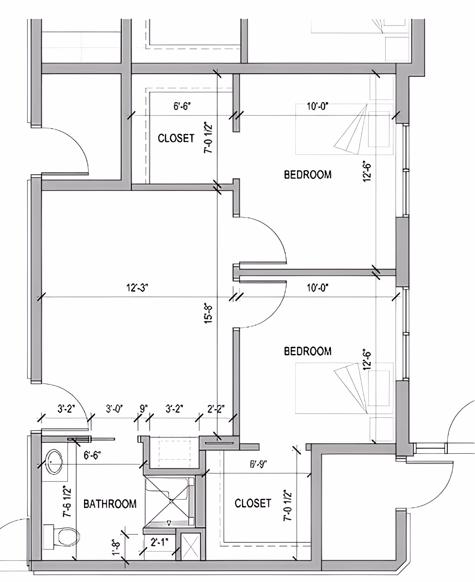 Architectural floor plan drawing showing two bedrooms, closets, and a bathroom with dimensions.