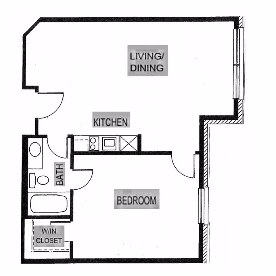 Floor plan layout of a senior living unit at Holiday Columbia Pines showing a bedroom with a walk-in closet, a bathroom, a kitchen, and a combined living and dining area.