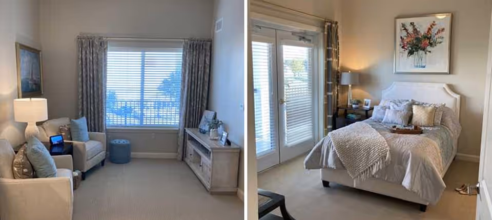 Furnished senior living suite with a sitting area featuring armchairs and a console on the left and a bedroom with a bed, nightstands and glass doors on the right.