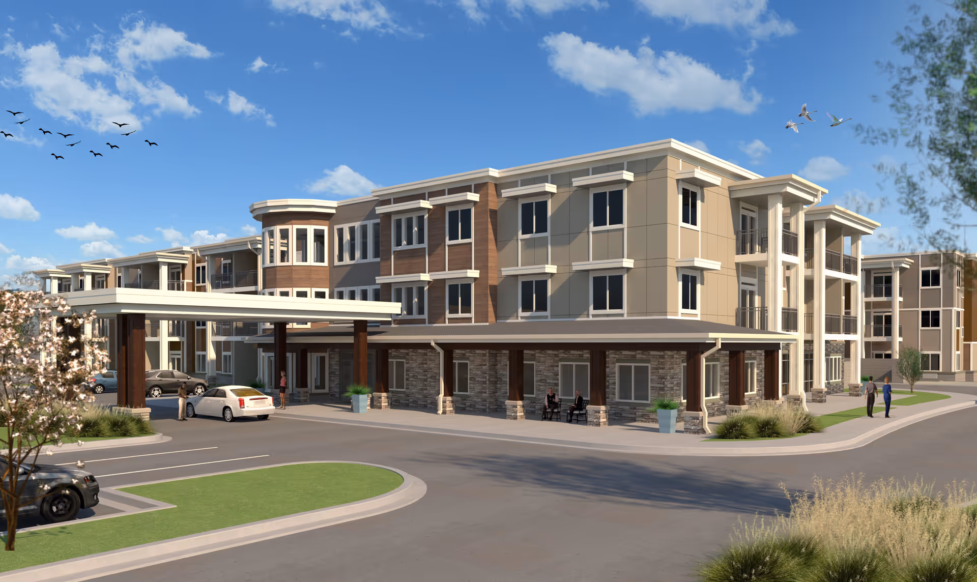 Three-story senior living facility with a covered porte-cochère entrance, parking spaces, and landscaped grounds under a blue sky.