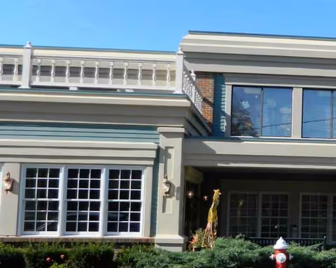 Exterior view of CareCore at Westmoreland building entrance with large windows.