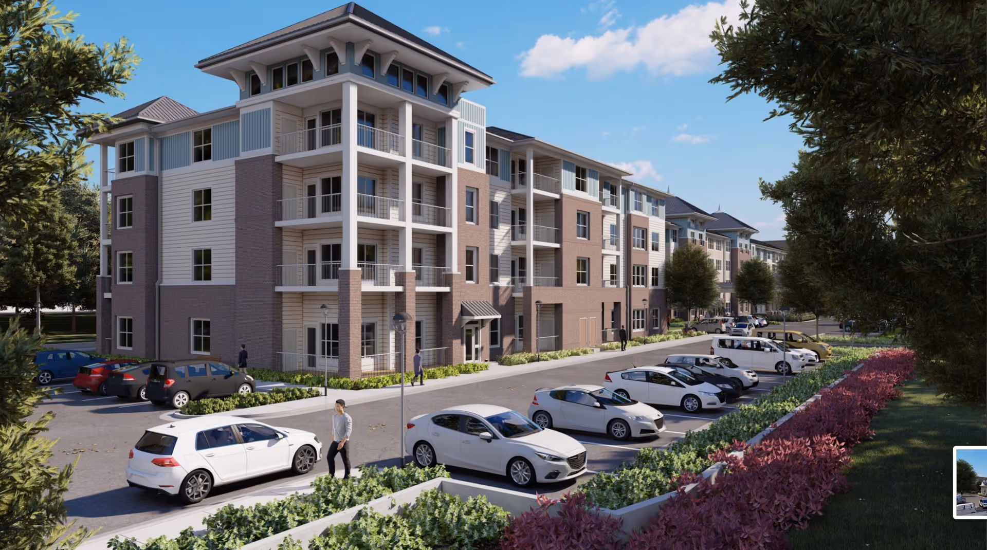 Exterior view of a multi-story senior living facility named Acclaim at Cary Pointe with a parking lot in front, several parked cars, landscaped greenery, and a few people walking near the building under a blue sky with some clouds.