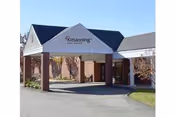 Front entrance of Kittanning Health & Rehab Center with a peaked canopy
