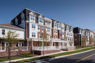Exterior view of Brightview Towson senior living building with balconies and landscaping