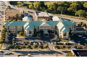 Aerial view of Gino J Merli Veterans Center, a multi-wing senior living facility.
