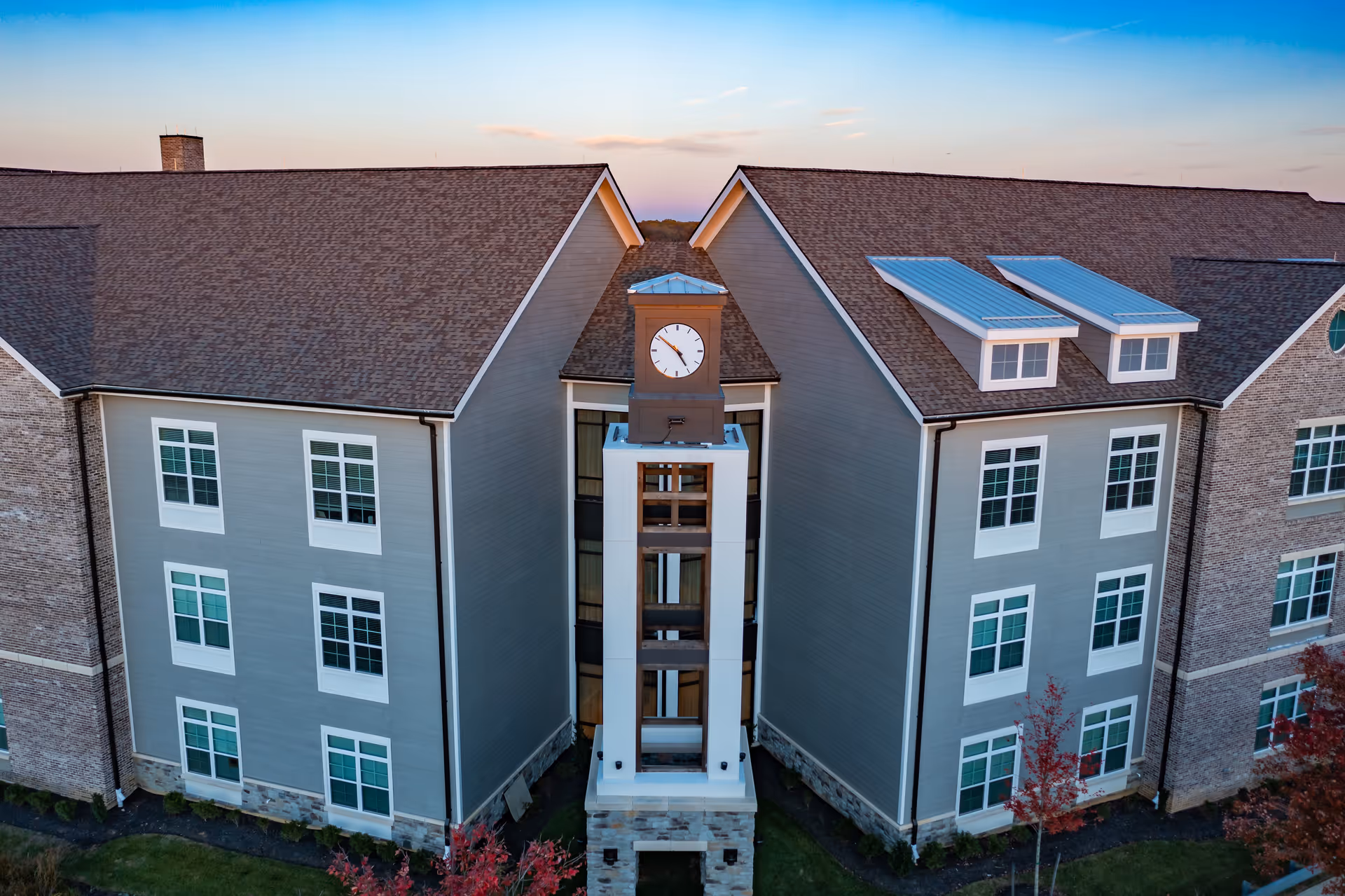 Aerial view of Tribute at Melford exterior featuring a central clock tower.