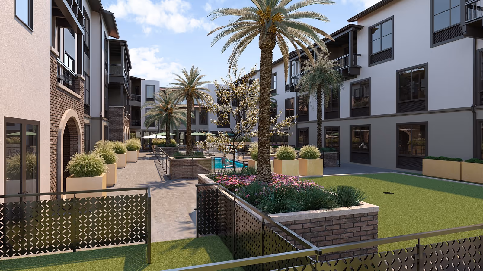 Outdoor courtyard area of MorningStar Senior Living of Mission Viejo featuring palm trees, landscaped planters with flowers and shrubs, a small pool, and surrounding multi-story residential buildings under a partly cloudy sky.
