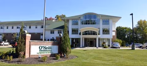 Exterior view of O'Neill Healthcare North Olmsted with sign, entrance, and parking.