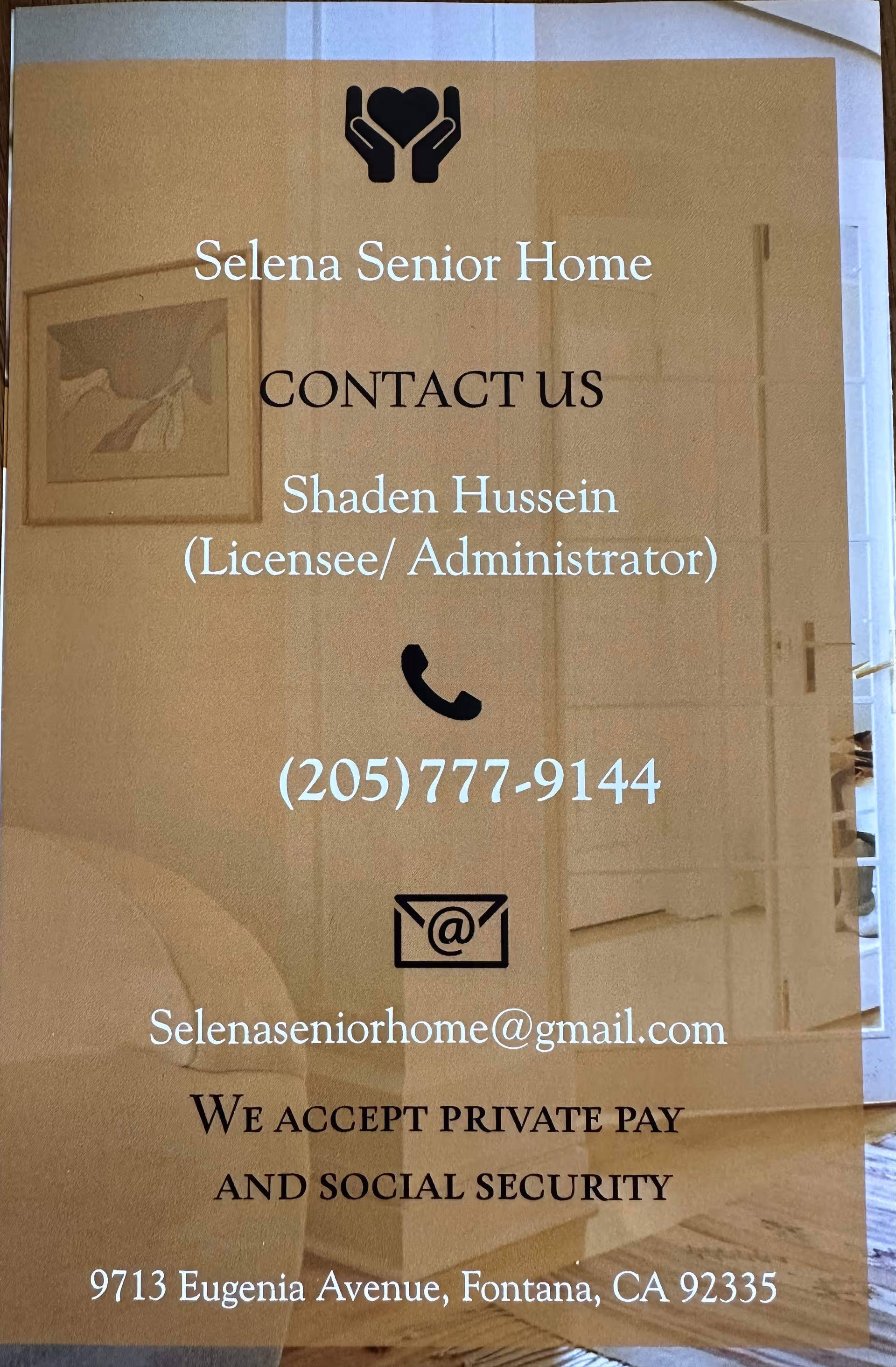 Contact information for Selena Senior Home including the name of the licensee/administrator Shaden Hussein, phone number (205) 777-9144, email Selenaseniorhome@gmail.com, and address 9713 Eugenia Avenue, Fontana, CA 92335. The background shows a softly lit interior with a door, part of a couch, and a framed picture on the wall.