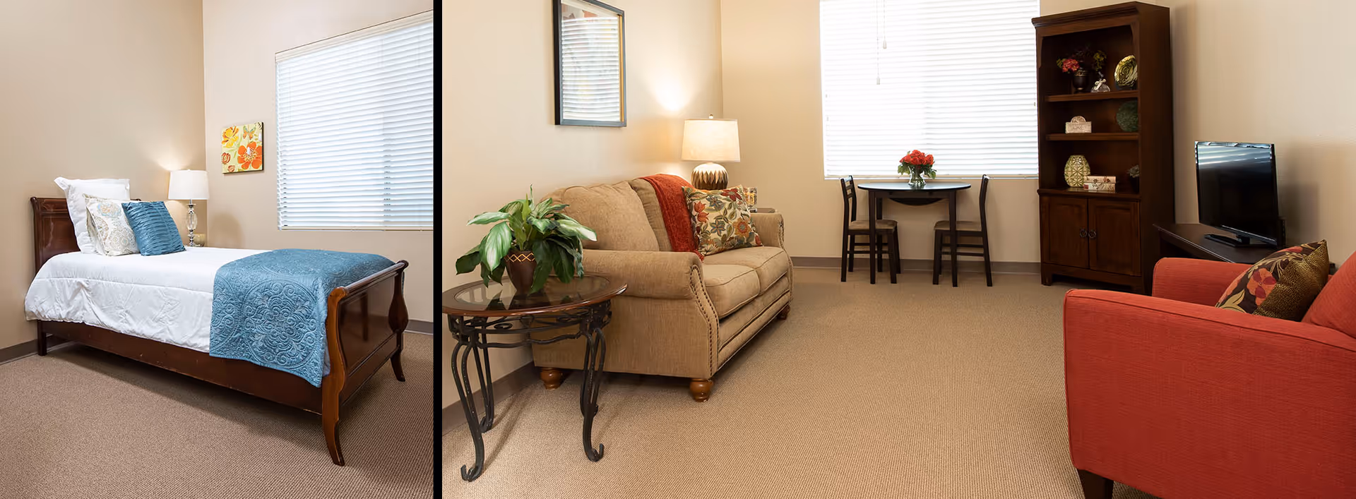 Bright senior-living suite showing a bed on the left and a living area with a sofa, armchair, small table and TV on the right.