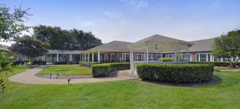 Brookdale North Austin senior living facility with a covered entrance and manicured lawn