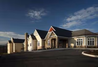 Exterior view of Williamsport Health & Rehabilitation Center entrance with front façade.