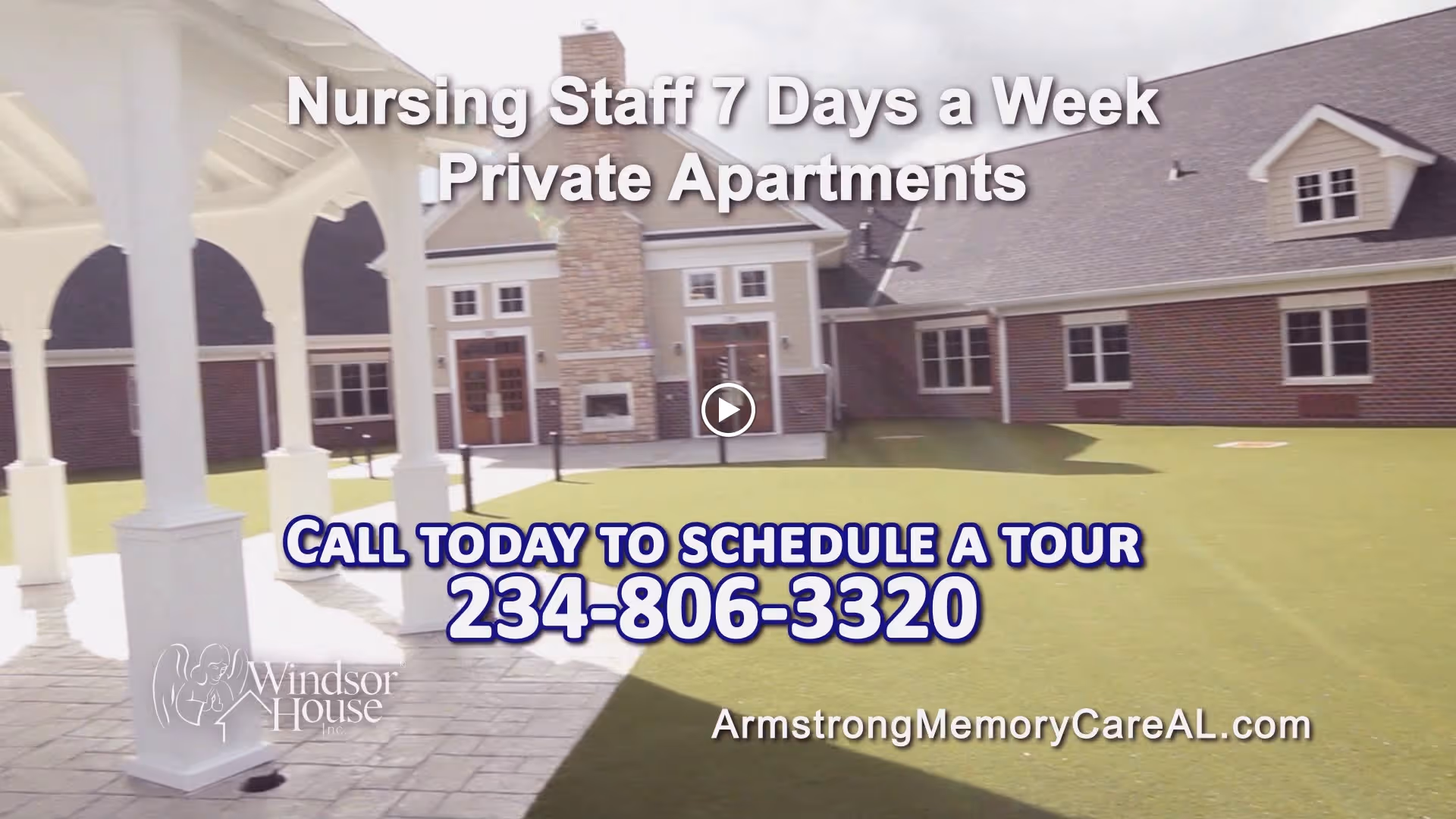 Outdoor courtyard with a white gazebo and green lawn in front of a brick memory care building with promotional overlay text and phone number.