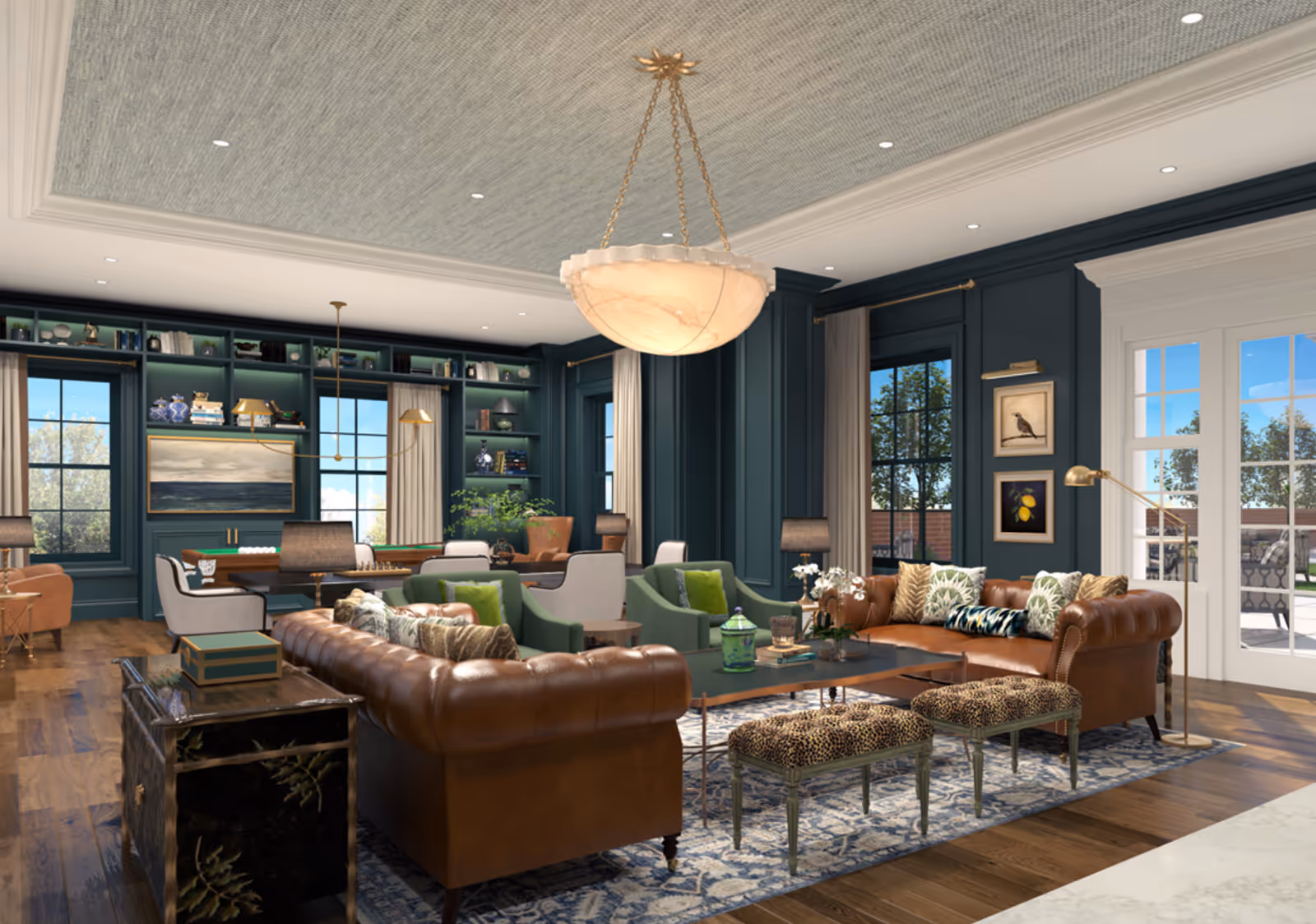 A spacious and elegant living room with dark teal walls, large windows with beige curtains, and a patterned ceiling. The room features two brown leather Chesterfield sofas with decorative pillows, two green armchairs, and two leopard print stools around a central coffee table on a blue patterned rug. In the background, there is a large built-in bookshelf with various books and decorative items, a wooden table with chairs, and a large hanging light fixture. French doors open to an outdoor patio area with trees visible outside.