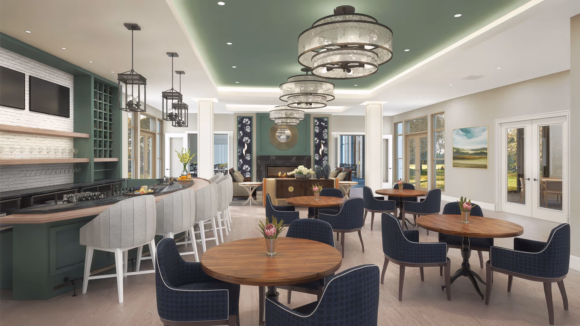 A spacious and elegant dining area featuring round wooden tables with blue upholstered chairs, a bar with high gray cushioned stools, pendant lights, and a fireplace with decorative panels and a round mirror above it. Large windows and glass doors allow natural light to fill the room, and the ceiling has a green accent with recessed lighting.