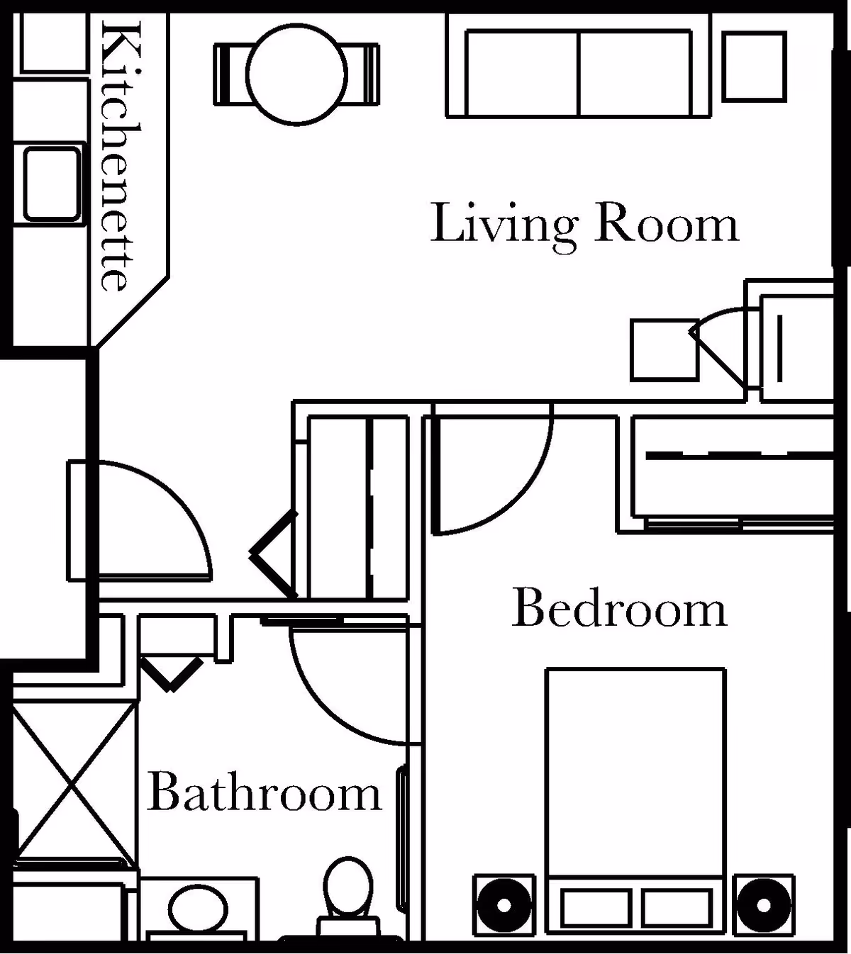 Floor plan of a living space at Heritage Woods of Mt. Vernon showing a kitchenette, living room with sofa and table, bedroom with bed and nightstands, and a bathroom with toilet and shower.