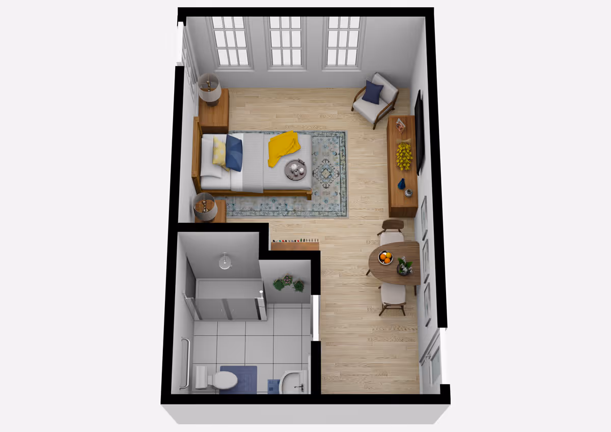 3D floor plan of a small studio apartment featuring a bedroom area with a bed, two nightstands with lamps, a chair, a rug, and a TV on a stand. Adjacent to the bedroom is a small dining area with a round table and two chairs. The apartment also includes a bathroom with a shower, toilet, and sink.