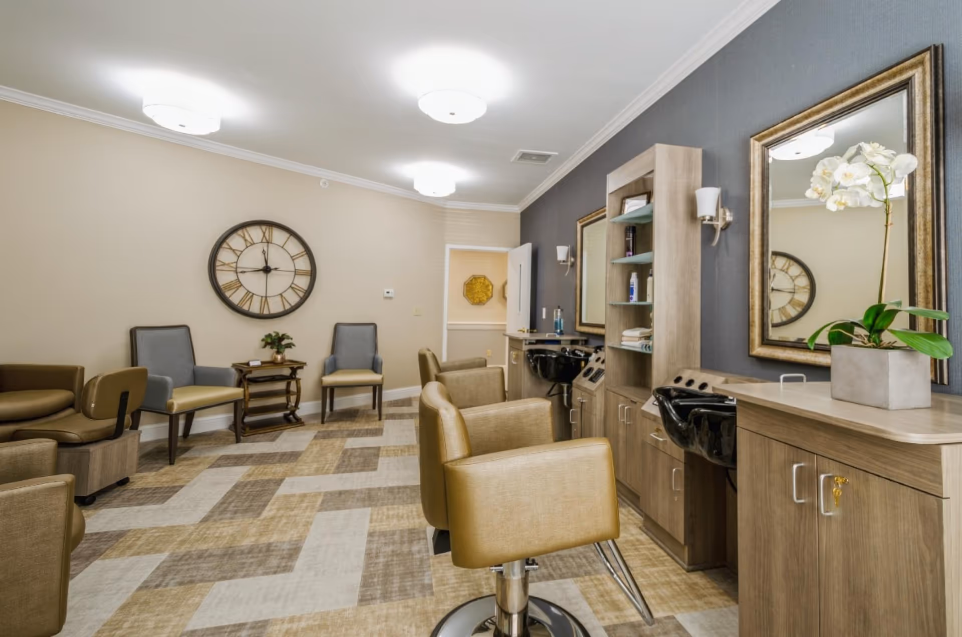 Bright salon and waiting area with styling chairs, shampoo sinks, mirrors, and additional seating.