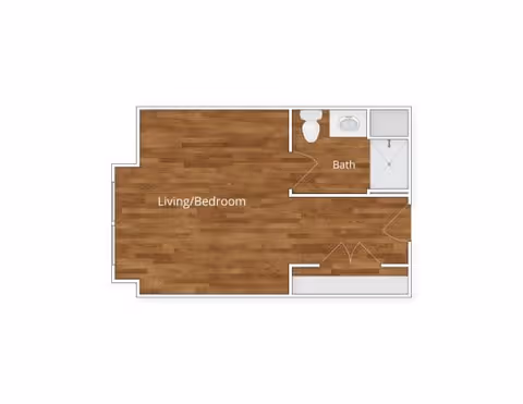 Floor plan of a small living space labeled with a combined living and bedroom area and a separate bathroom including a toilet, sink, and shower.