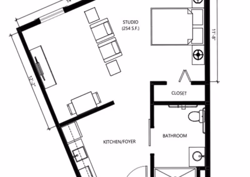 Studio floor plan with kitchenette, living area, bed, closet, and bathroom.