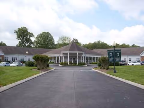 Exterior view of Morning Pointe of Tullahoma with a circular driveway and central entrance.