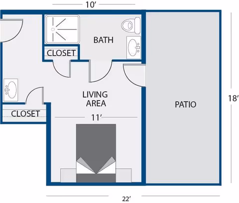 Floor plan of a living area with a bed, two closets, a bathroom with a shower, toilet, and sink, and an adjacent patio area.