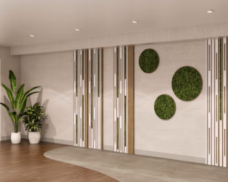 Interior view of a modern room with decorative vertical wooden panels featuring green moss inserts on the wall, three circular green moss decorations, and two potted plants on the left side. The floor has a combination of wood and carpet.