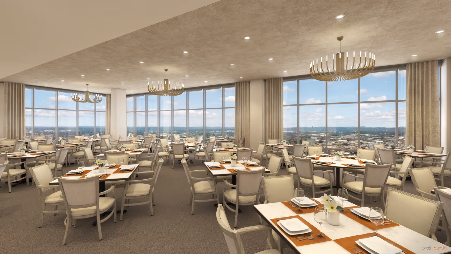 A spacious dining room with multiple tables set with white plates, wine glasses, and floral centerpieces. The room features large floor-to-ceiling windows offering a panoramic view of the cityscape outside. The ceiling has recessed lighting and modern chandeliers, and the walls are adorned with beige curtains.