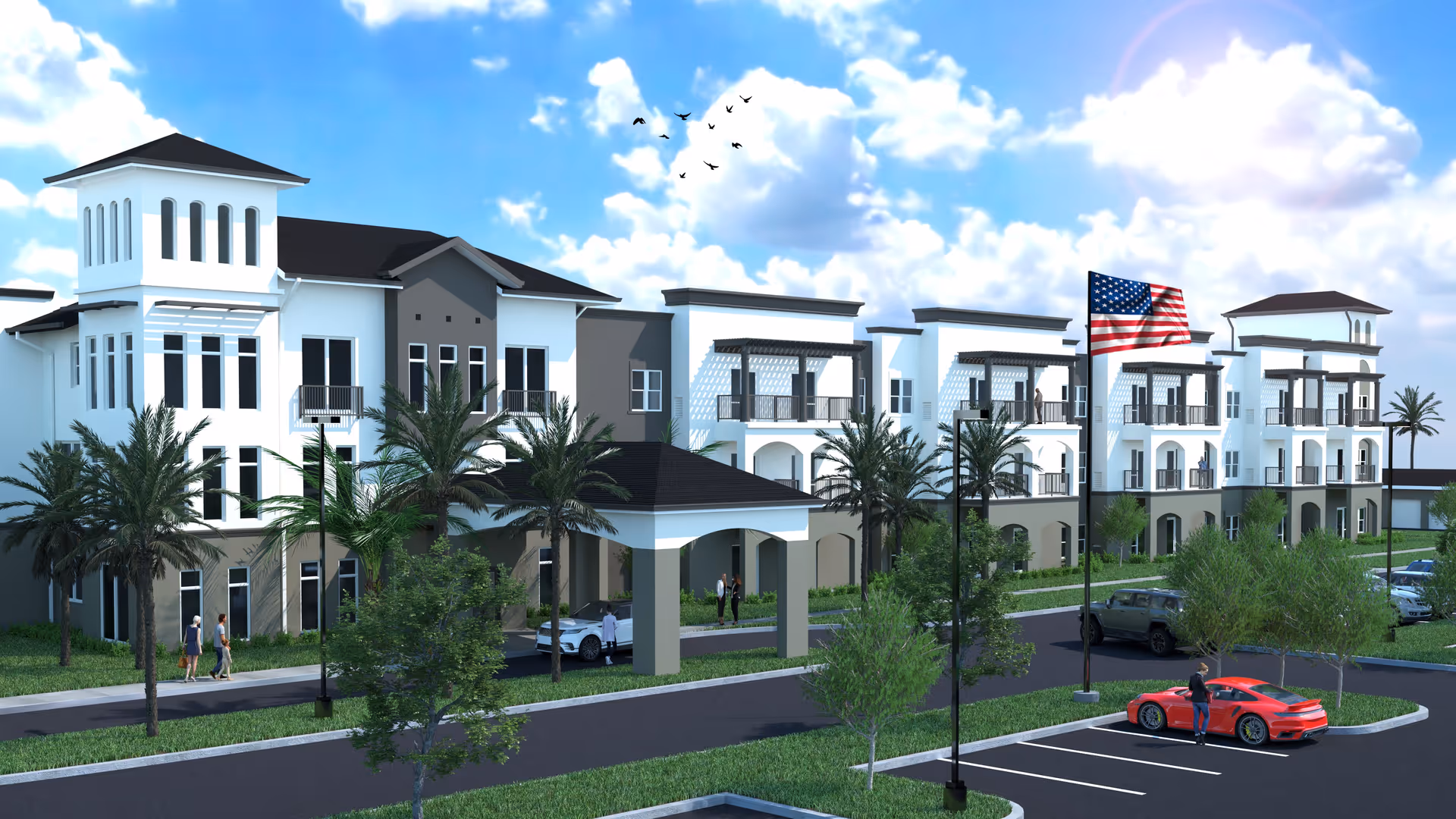 Three-story white senior living building front with balconies, palm trees, an American flag, and a parking lot with cars under a partly cloudy sky.