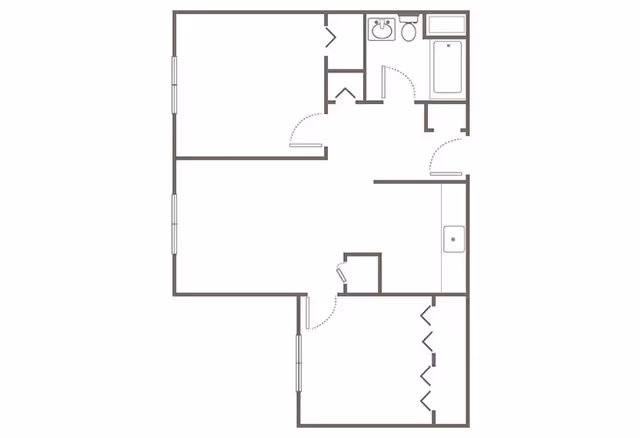 Architectural floor plan of a residential unit showing multiple rooms including a bathroom with a sink, toilet, and bathtub, a kitchen area with a sink, and several other rooms with doors and closets.