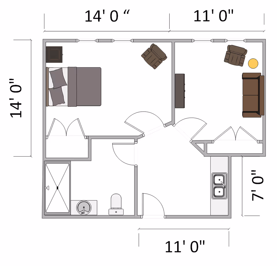 Architectural floor plan of a small apartment unit showing a bedroom with a bed and nightstand, a living room with a sofa, two armchairs, and a side table, a bathroom with a shower, sink, and toilet, and a kitchen area with a double sink. Dimensions are marked on the exterior walls.
