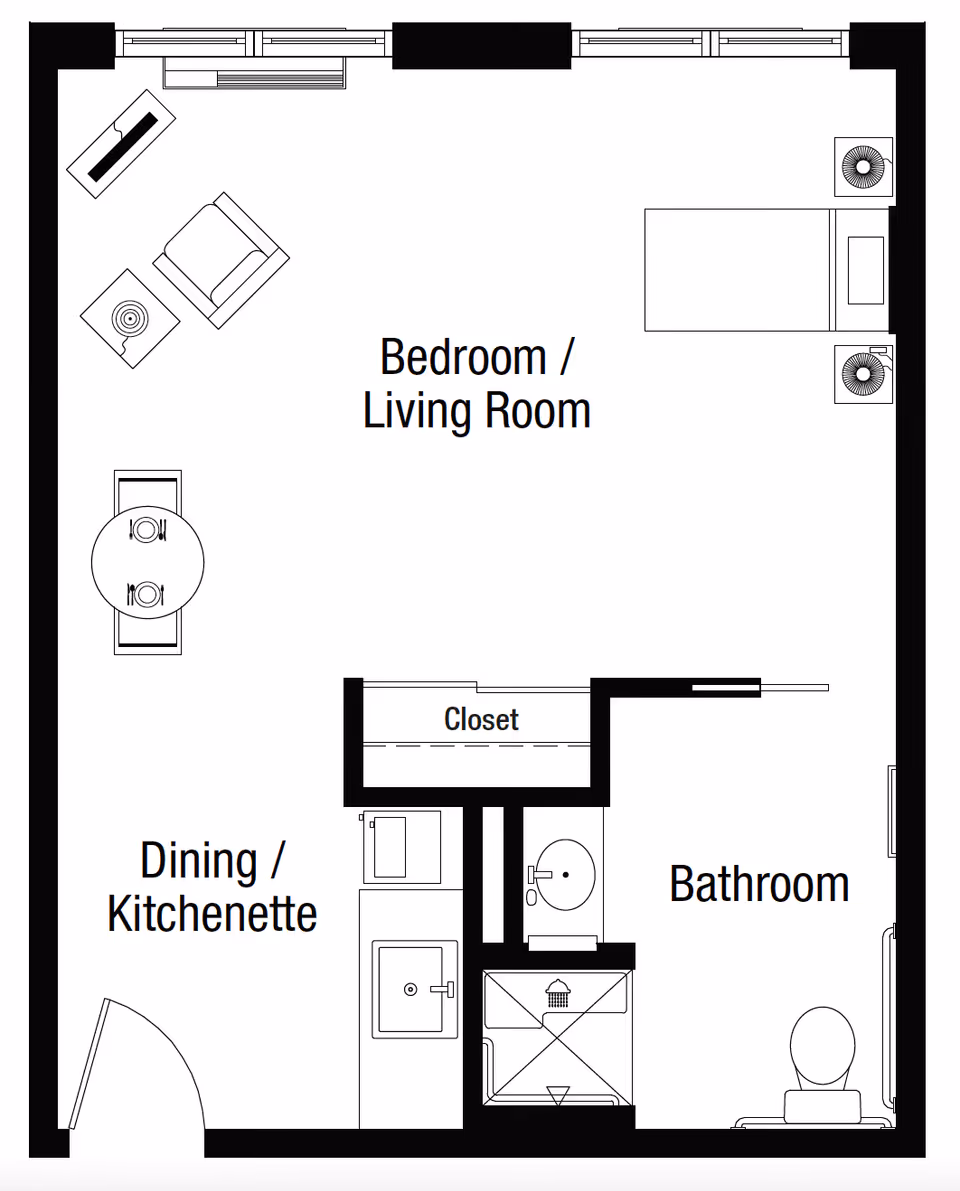Floor plan layout of a senior living facility unit at White Oaks at Spring Street showing a combined bedroom and living room area, a dining/kitchenette area, a closet, and a bathroom with a shower, sink, and toilet.