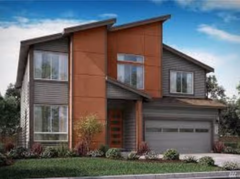 Modern two-story building exterior with red panel accents, windows, and a two-car garage.
