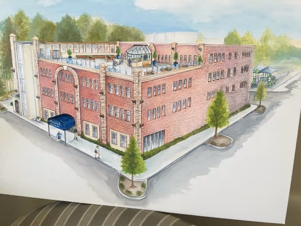 Illustration of a three-story brick building with multiple windows, a blue awning entrance, rooftop seating area with plants, and surrounding sidewalks and trees, representing Monarch House in Newnan, Georgia.