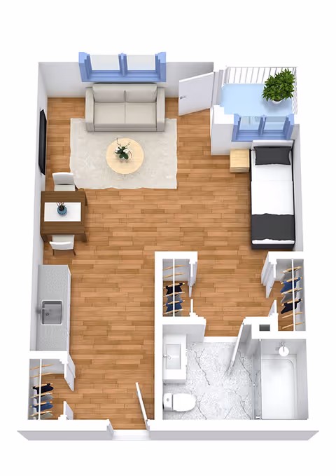 3D top-down floor plan of a studio apartment showing a living area with sofa and TV, kitchenette, bedroom alcove, bathroom, closets, and a small balcony.