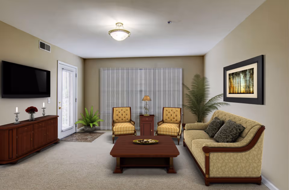 Furnished living room with a sofa, two armchairs, a coffee table, wall-mounted TV, sideboard, and potted plants.