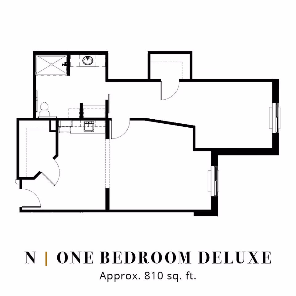 Floor plan layout of a one bedroom deluxe apartment with an approximate area of 810 square feet, showing rooms including a bathroom, kitchen, and living spaces.