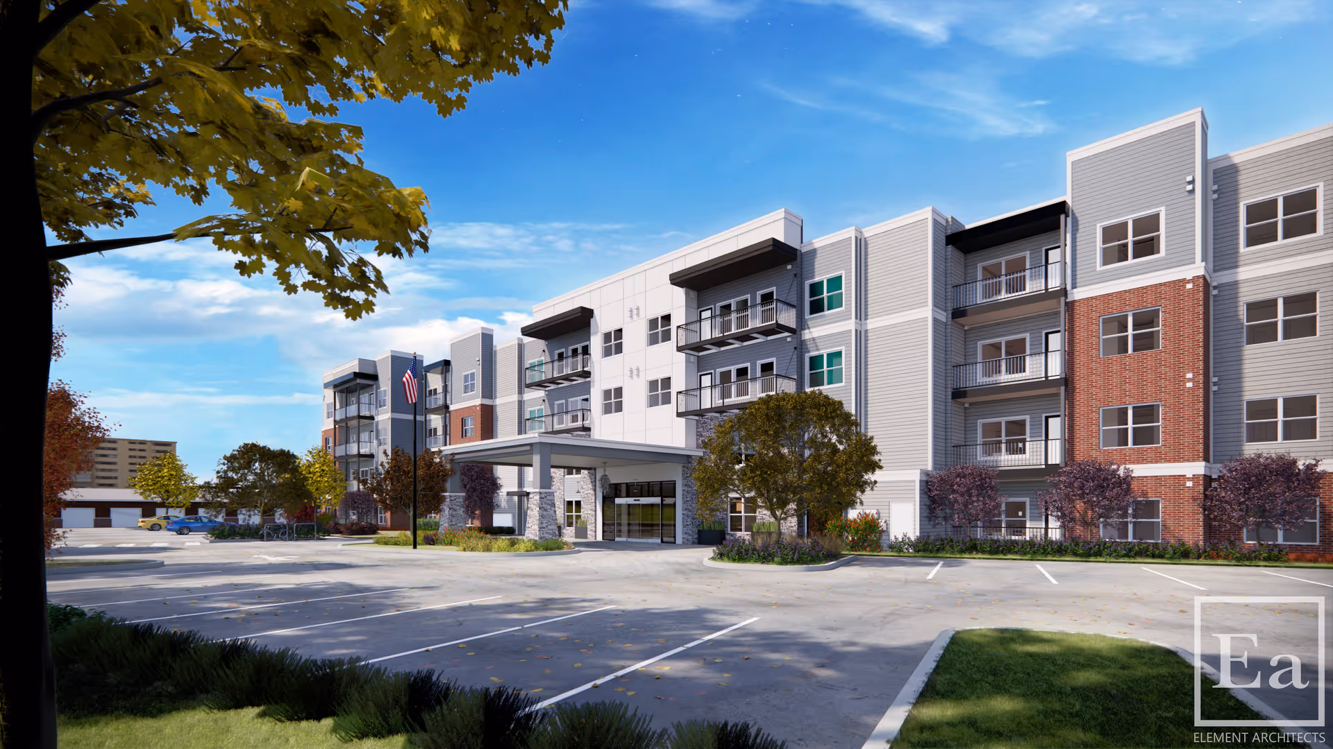 Exterior view of a modern multi-story senior living facility named Outlook Hamilton with a spacious parking lot in front, landscaped greenery, and a clear blue sky above.