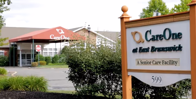 CareOne at East Brunswick exterior entrance with prominent sign and canopy.