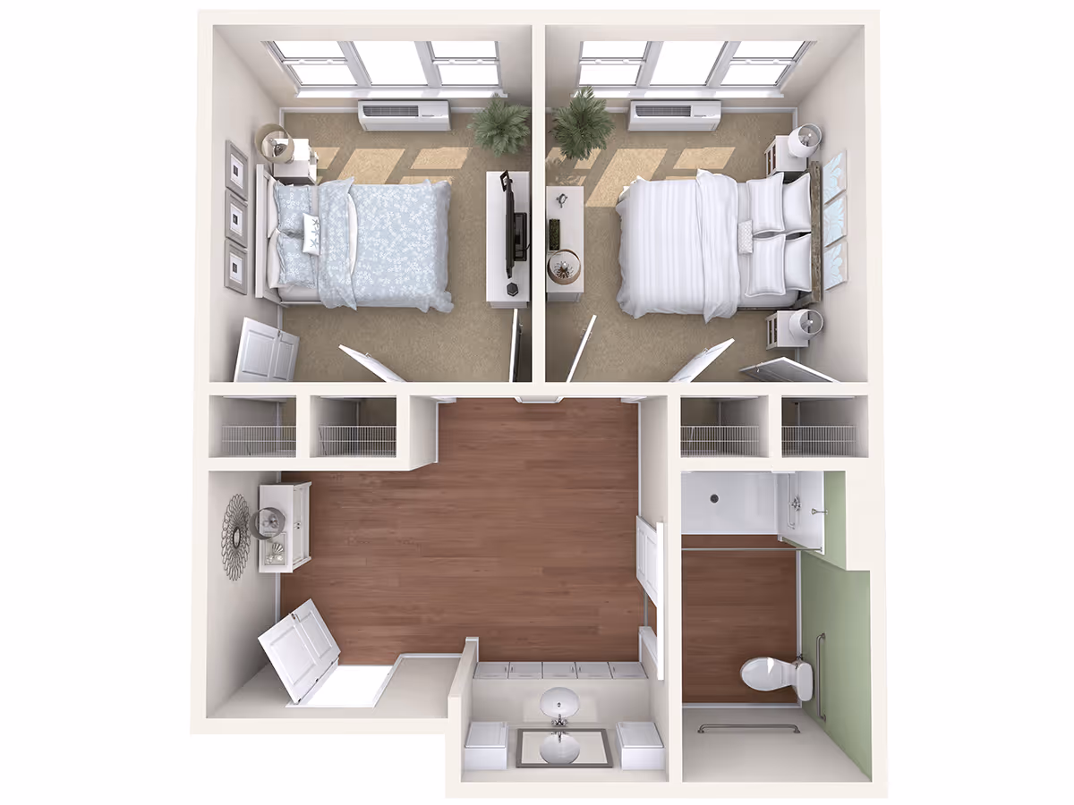 Top-down floor plan of a senior living unit at The Sheridan at Green Oaks featuring two bedrooms with beds, nightstands, and windows. The central area has a wooden floor and closet spaces. The bathroom includes a toilet, sink with double vanity, and a shower area.