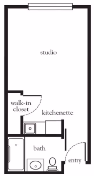 Floor plan of a studio apartment featuring a studio living area, a kitchenette, a walk-in closet, a bathroom with a bathtub, sink, and toilet, and an entry door.