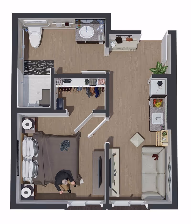 Top-down 3D floor plan of a studio apartment showing a bed area, walk-in closet, bathroom with shower, kitchenette, and living area with sofa and TV, with a person sitting on the bed.
